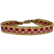Pulsera Kenia Hecha a Mano en Tonos Rosa, Rojo y Dorado