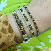 Pulsera Greta Hecha a Mano en Tonos Rosa, Negro y Dorado