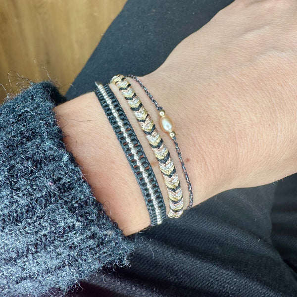 Pulsera Trenza Hecha a Mano en Tonos Negro, Plata y Oro Rosa