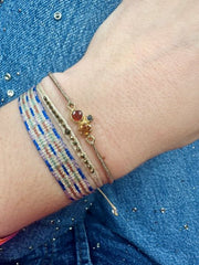 Pulsera Frida Hecha a Mano con Hematitas Facetadas y Piedra Obsidiana Dorada