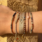 Pulsera Golden  Tejida a Mano con 160 Hilos  Piedra de Espinel  y Detalles Dorados