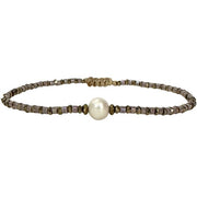 Pulsera de lujo hecha a mano en tonos lilas con una perla de agua dulce