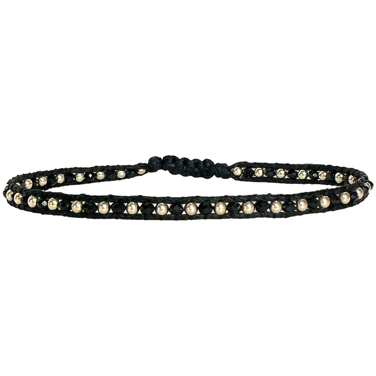 Pulsera Nila Hecha a Mano en Negro y Dorado