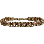 Pulsera hecha a mano con fénix dorado y terracota